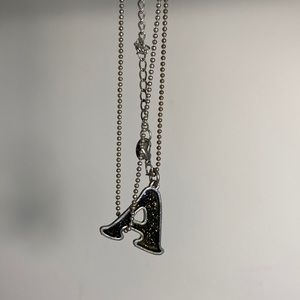 Claire’s letter A color changing mood necklace